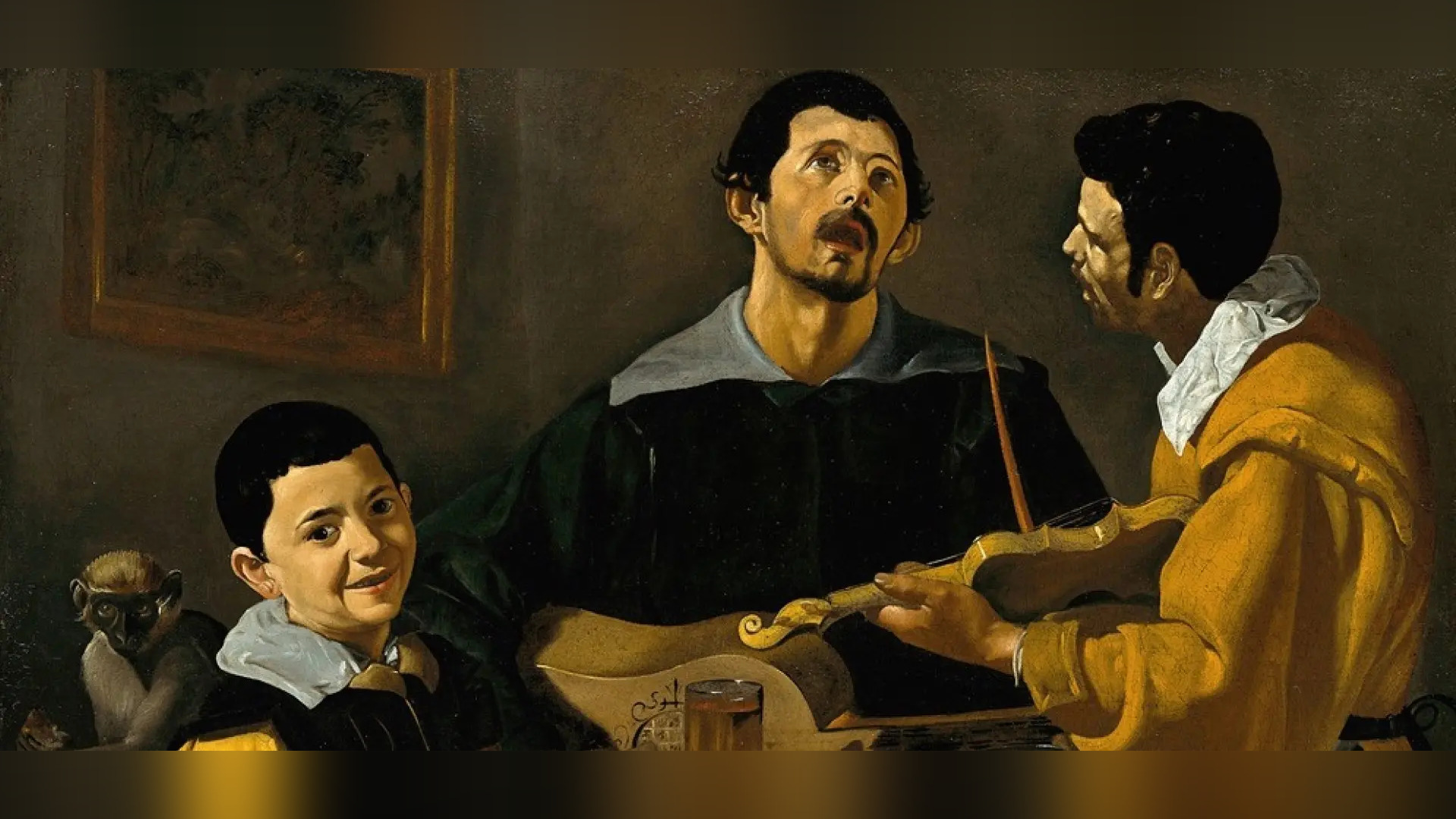 Pintura barroca de Velázquez con tres músicos cantando y tocando alrededor de una mesa, absortos en la música y mirando hacia arriba, mientras en la penumbra del borde izquierdo un mono se sirve de la comida sin que nadie lo advierta